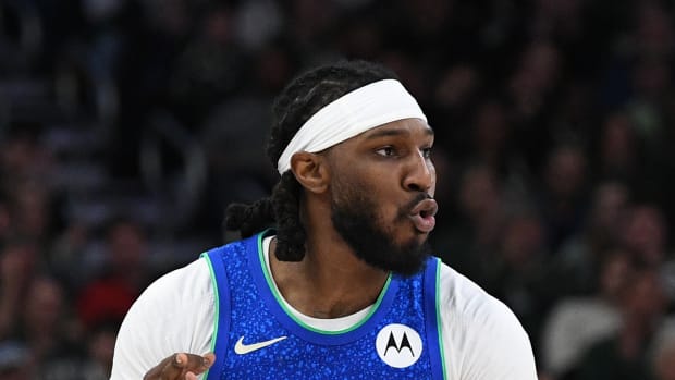 Milwaukee Bucks forward Jae Crowder (99) celebrates a made 3 point shot